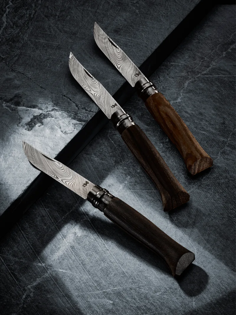 Drei Opinel Nr. 08 Damas Ziricote mit dunklem Holzgriff